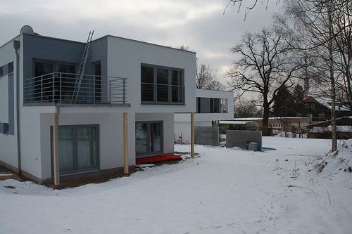 Holzrahmenbau als modernes EFH/Einfamilienhaus mit Balkon - Zimmerei Walther Dresden / Pirna