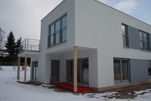 Einfamilienhaus als Holzrahmenbau mit Balkon - Zimmerei Walther Dresden / Pirna
