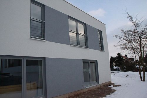 Modernes Einfamilienhaus als Holzrahmenbau verputzt - Zimmerei Walther Dresden / Pirna