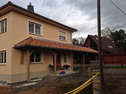 Carportanbau mit Klempnerarbeiten und Dacheindeckung in Romano von Creaton Flachdach Walmkonstruktion