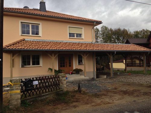 Carportanbau mit weitergeführtem Vordach